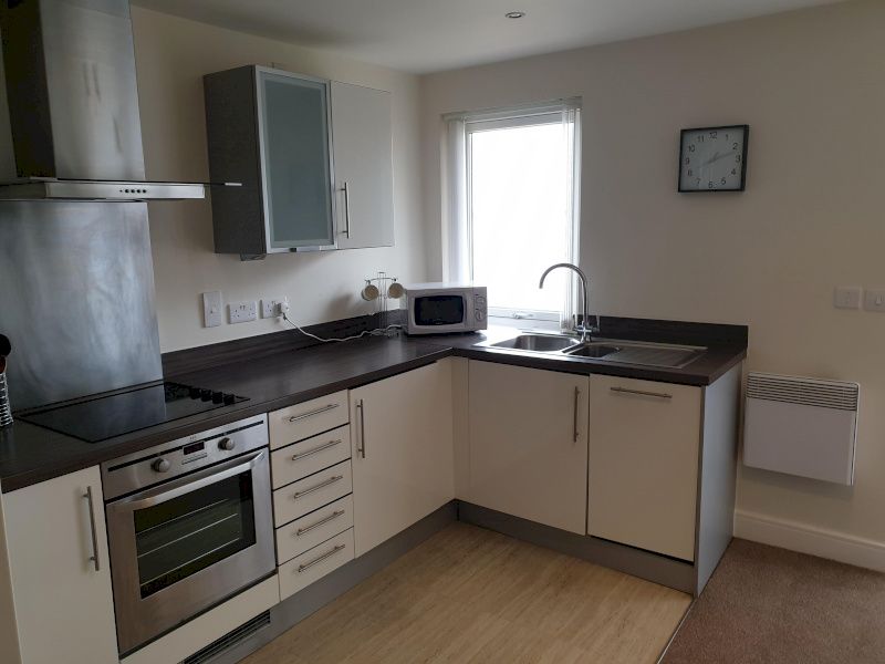 Property photo 3 of 8 Kitchen