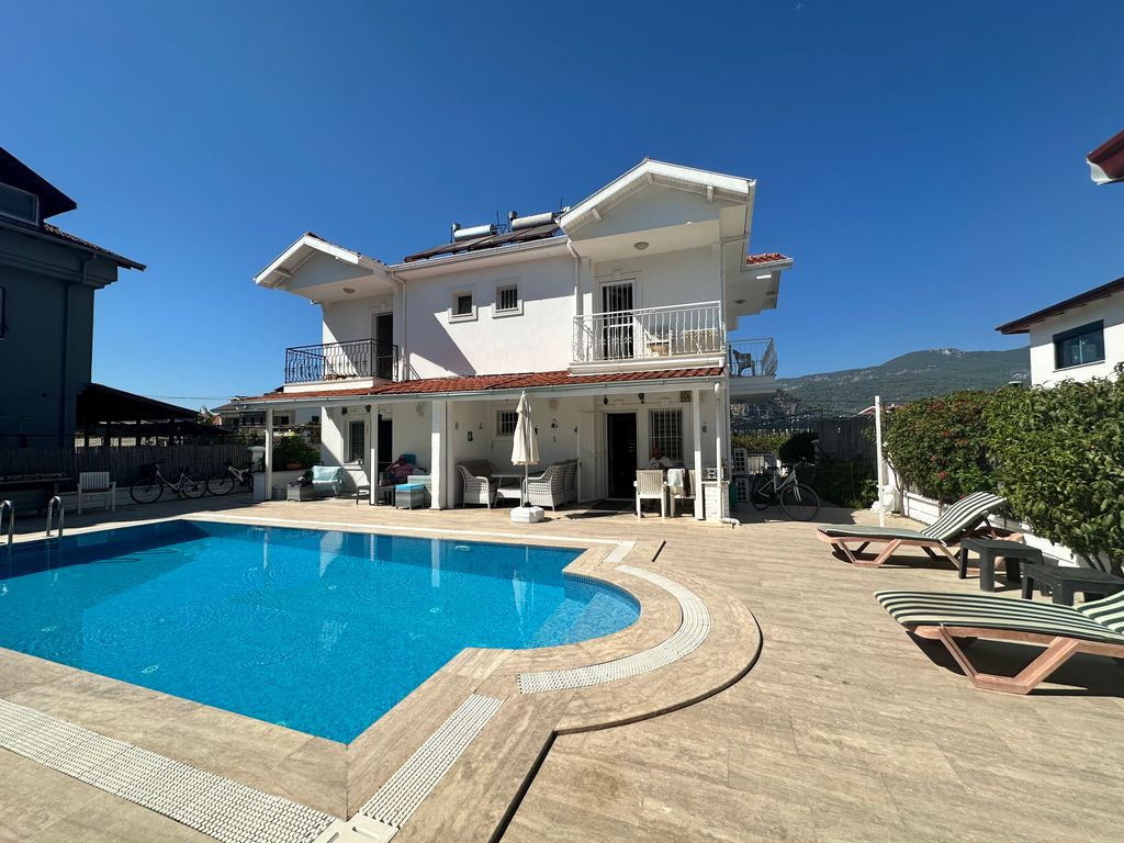 Property photo 1 of 21 A Lovely Semi-Detached Duplex Villa For Sale In Dalyan With A Shared Pool - Main View Of The Semi-Detached Property