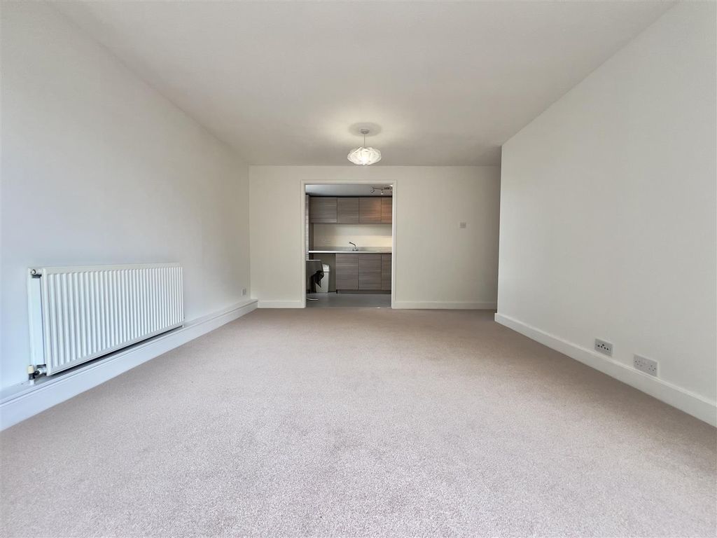 Property photo 2 of 9 Living Area