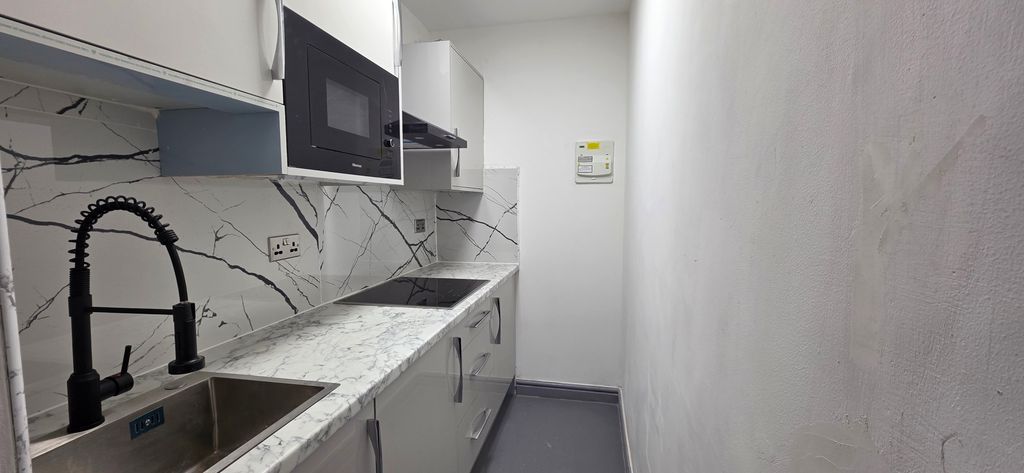 Property photo 2 of 4 Kitchen