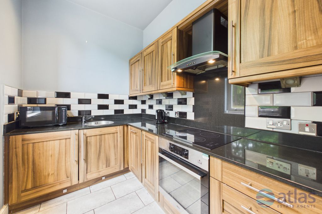Property photo 3 of 19 Kitchen