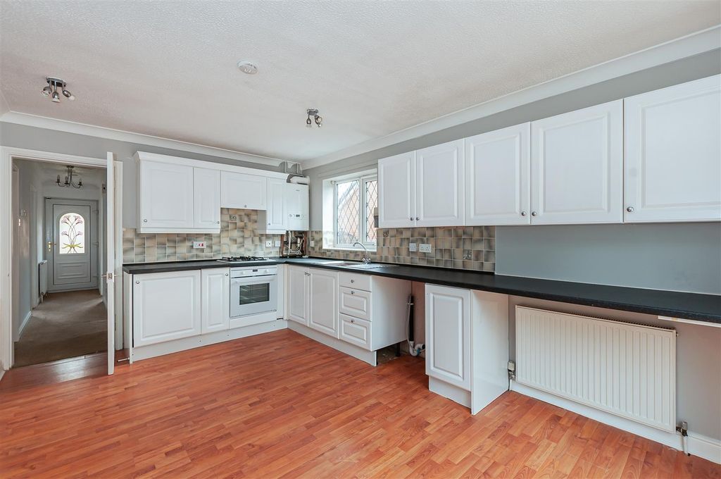 Property photo 2 of 10 Bright And Airy Kitchen With Ample Storage Space...