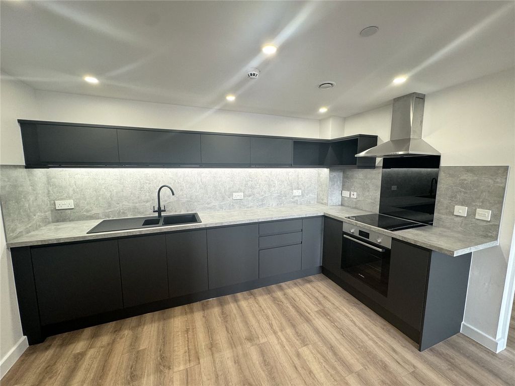 Property photo 2 of 9 Flat 203