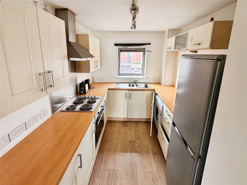 Property photo 3 of 6 Kitchen