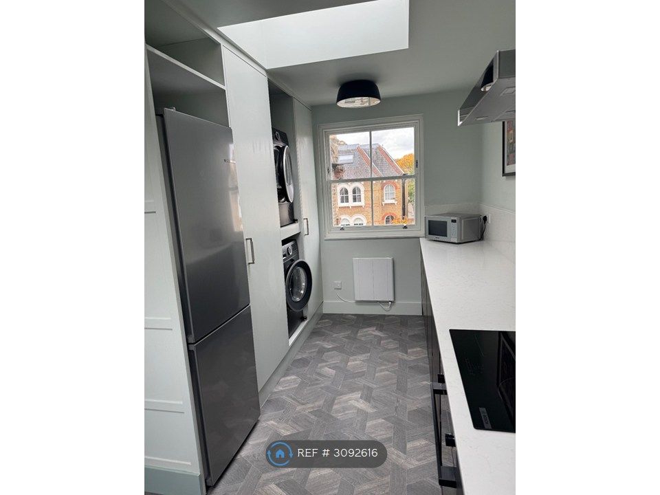 Property photo 3 of 17 Kitchen Toward Street