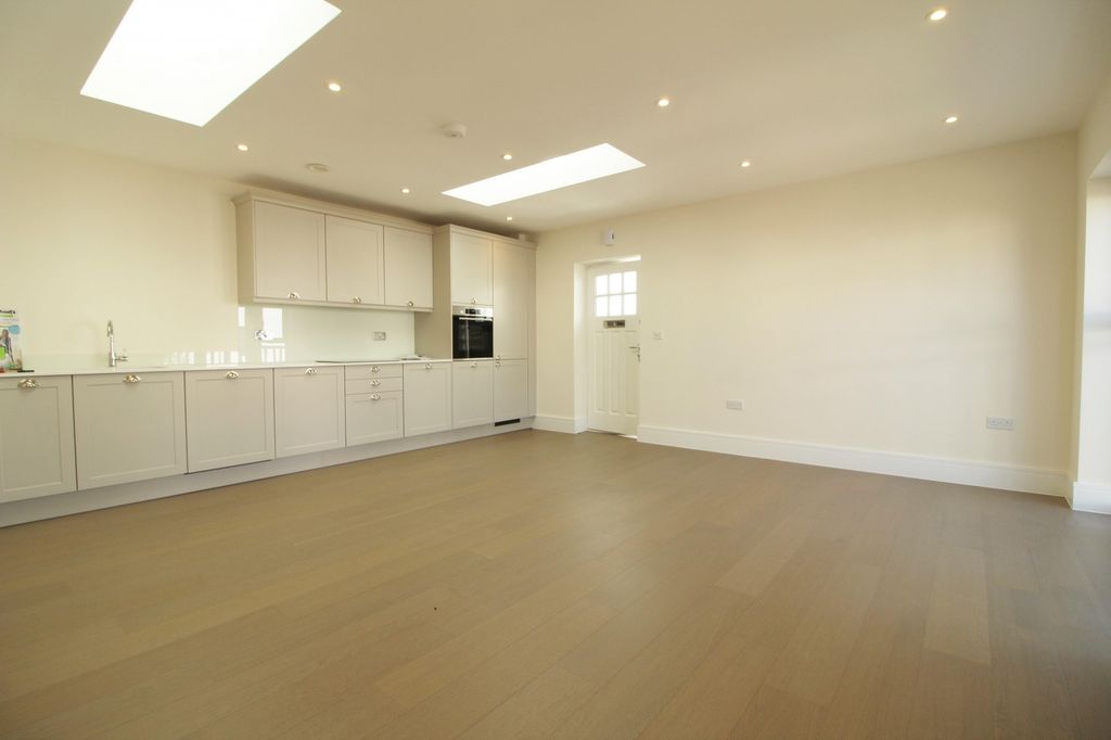 Property photo 2 of 7 Living Area - Kitchen