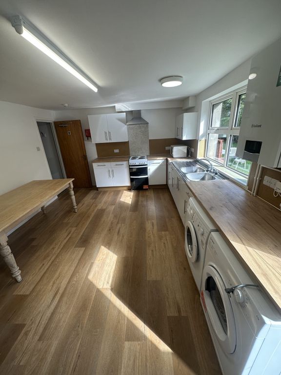 Property photo 2 of 5 Bright And Modern Kitchen With Ample Counter Space...