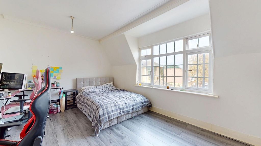 Property photo 1 of 17 A Bright And Airy Bedroom With A Large Window Allo...