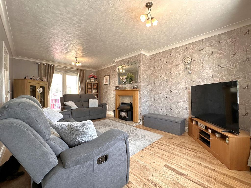 Property photo 2 of 18 Generous Living Room 219