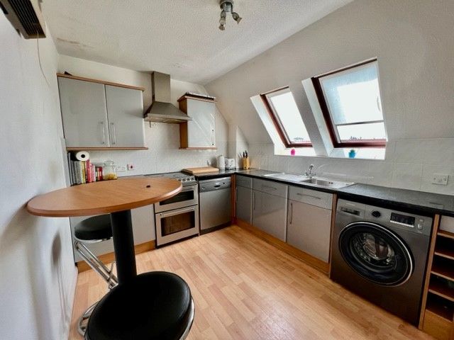 Property photo 2 of 8 Kitchen