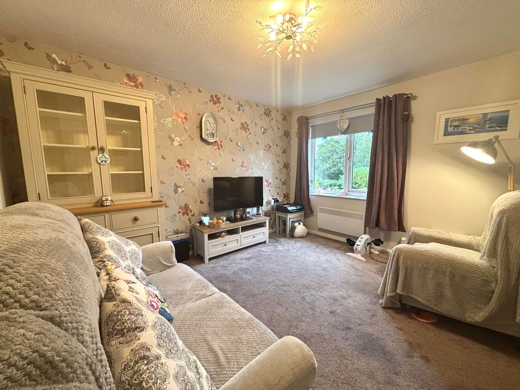 Property photo 3 of 12 Living Room 2