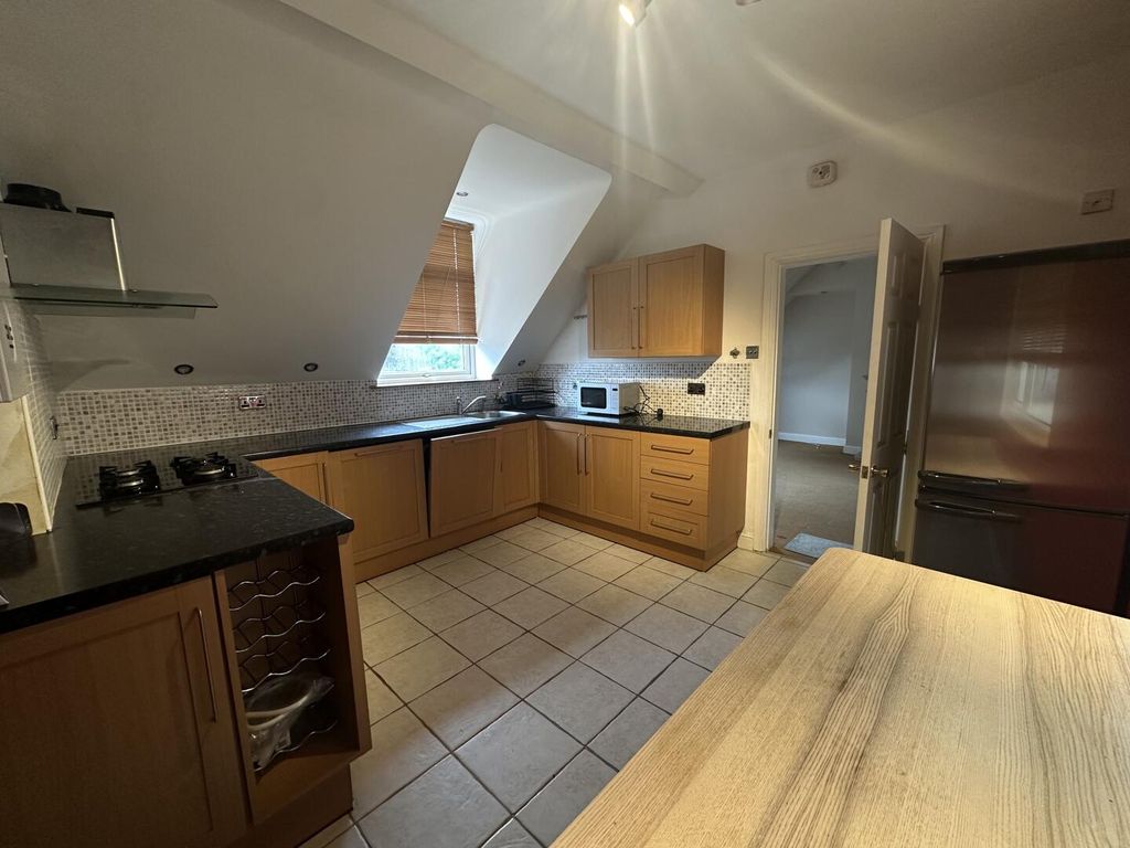 Property photo 3 of 8 Kitchen