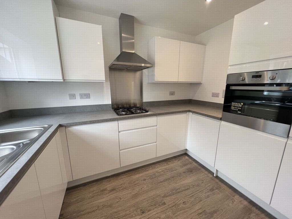 Property photo 3 of 8 Kitchen