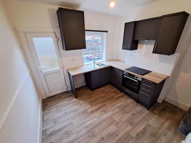 Property photo 2 of 8 Kitchen