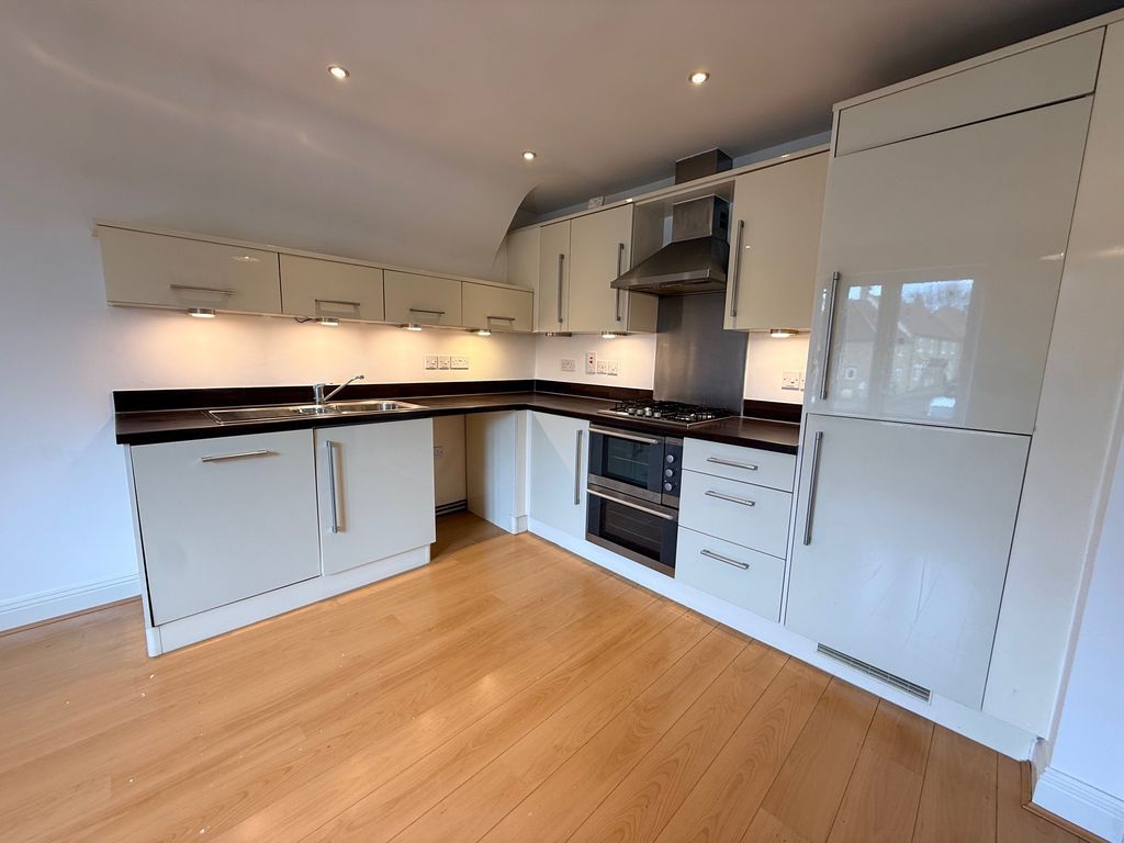 Property photo 3 of 11 Kitchen Area