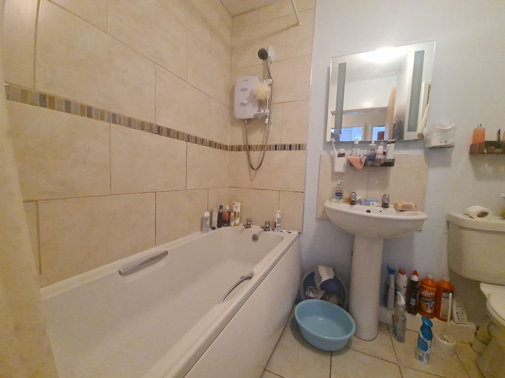 Property photo 3 of 4 A Clean And Functional Bathroom Featuring A Large ...