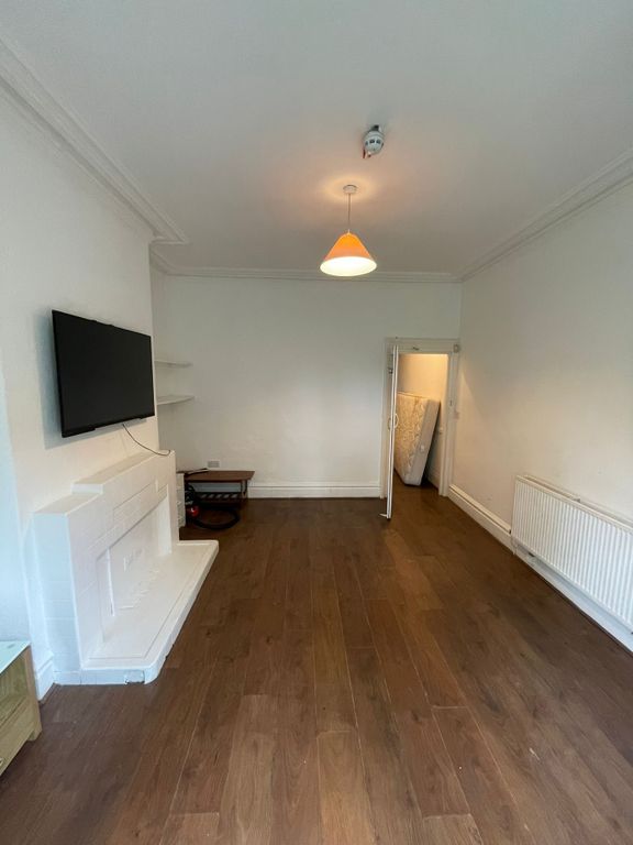 Property photo 3 of 11 A Spacious And Bright Living Room, Perfect For Soc...
