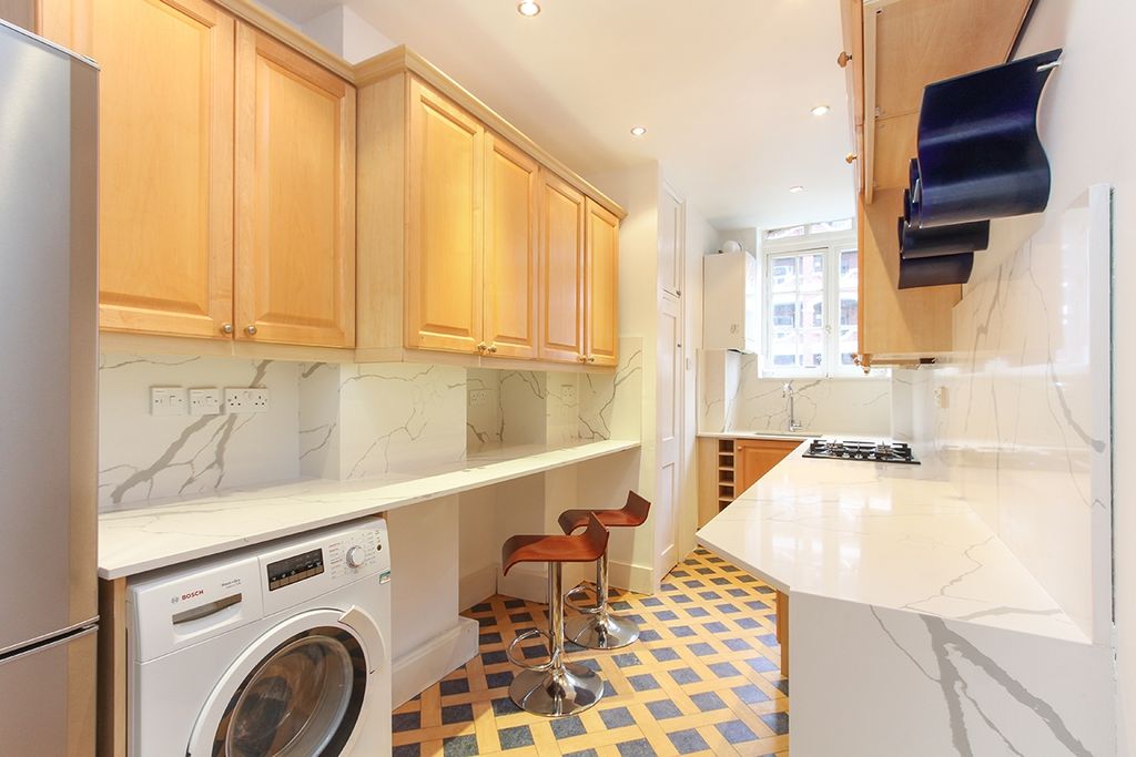 Property photo 3 of 8 Kitchen