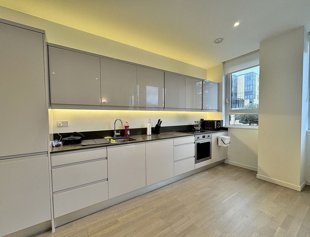 Property photo 2 of 8 Kitchen Area