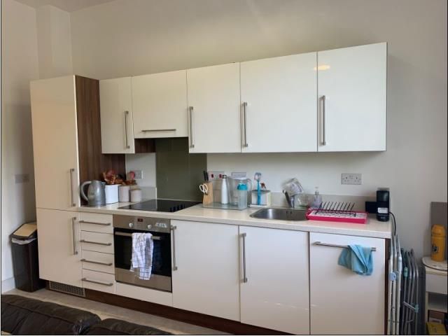 Property photo 1 of 6 Kitchen Area