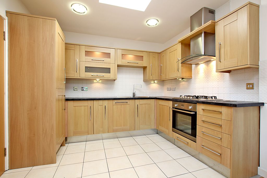 Property photo 3 of 12 Open-Plan Kitchen