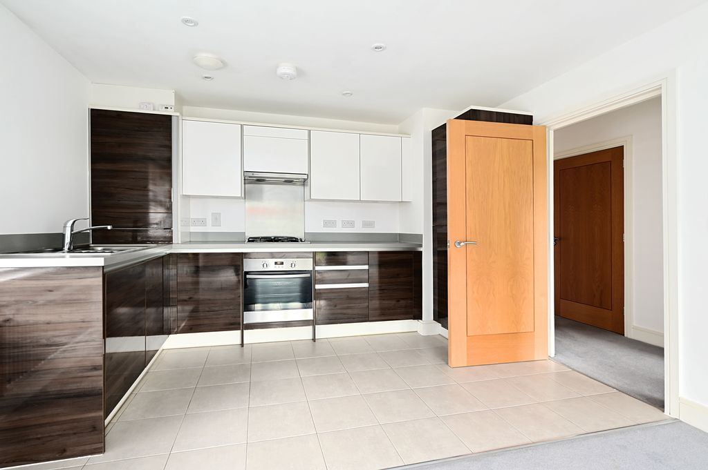 Property photo 2 of 10 Kitchen Area