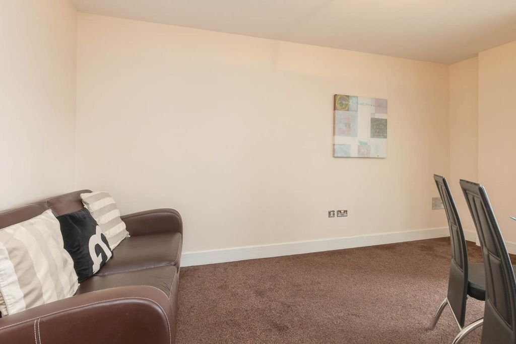 Property photo 2 of 12 Living Area