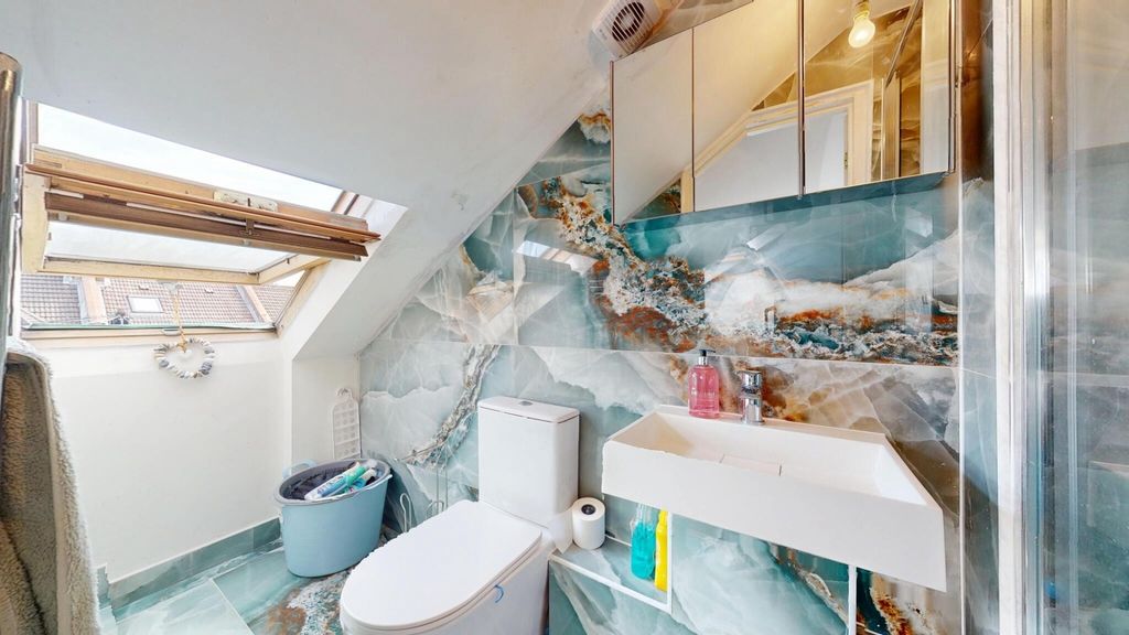 Property photo 3 of 15 A Modern Bathroom Suite Featuring A Large Skylight...