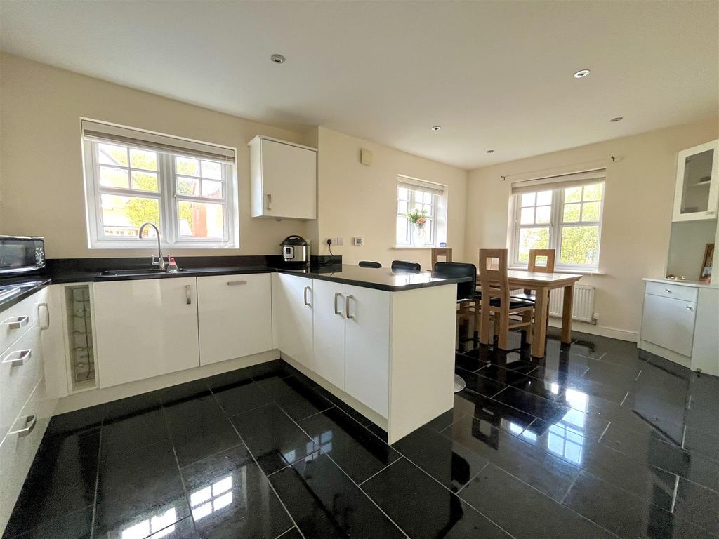Property photo 3 of 38 Dining Kitchen