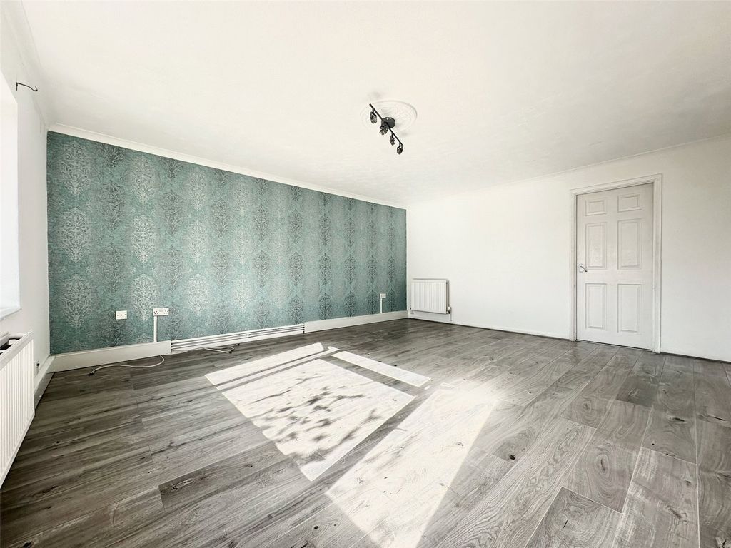 Property photo 3 of 16 Living Area