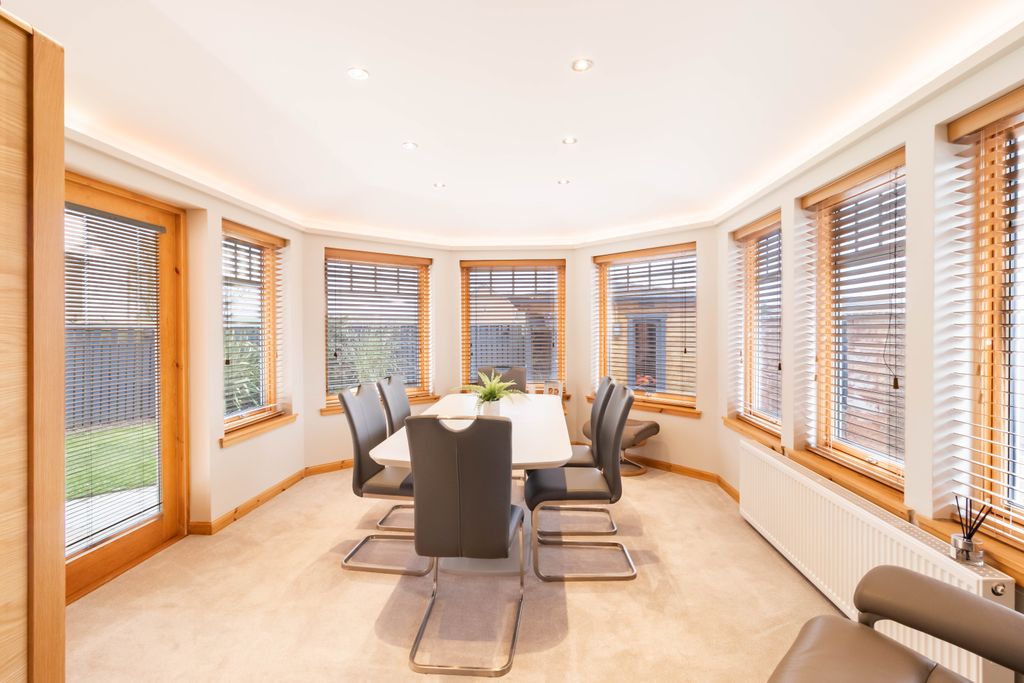 Property photo 3 of 38 Sunroom