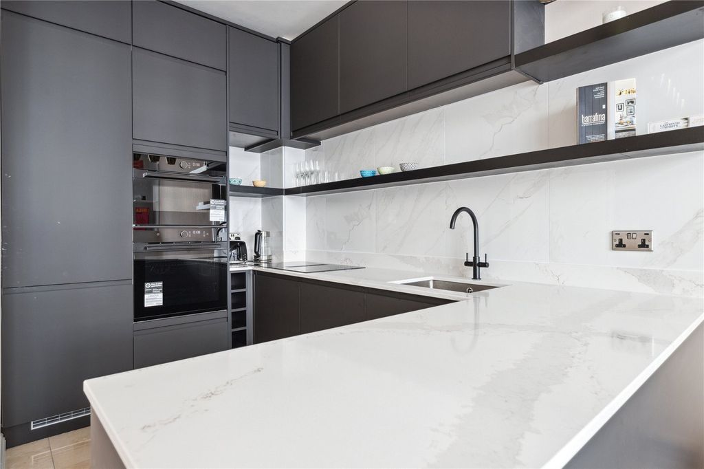 Property photo 3 of 8 Kitchen