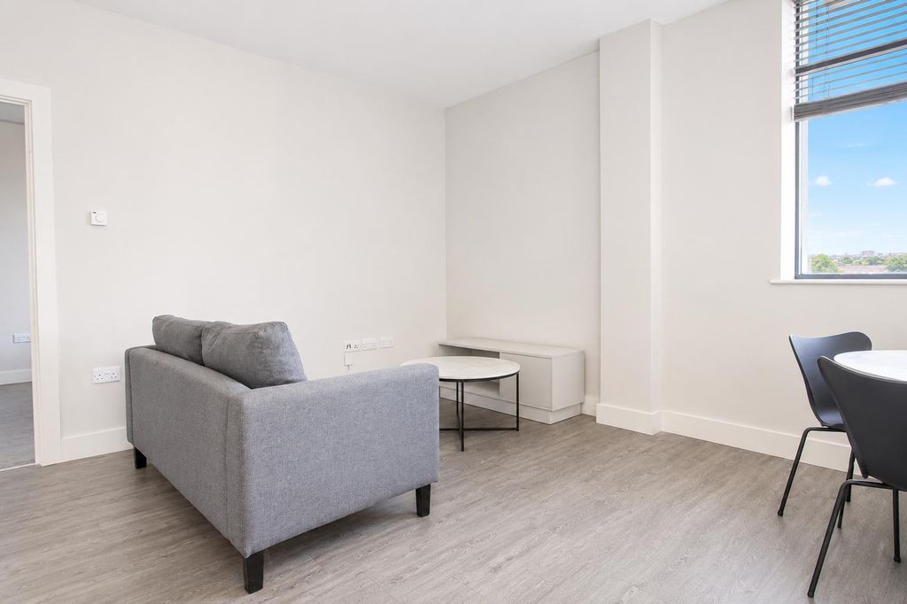 Property photo 3 of 7 Bright Modern Living Area With Stylish Sofa...