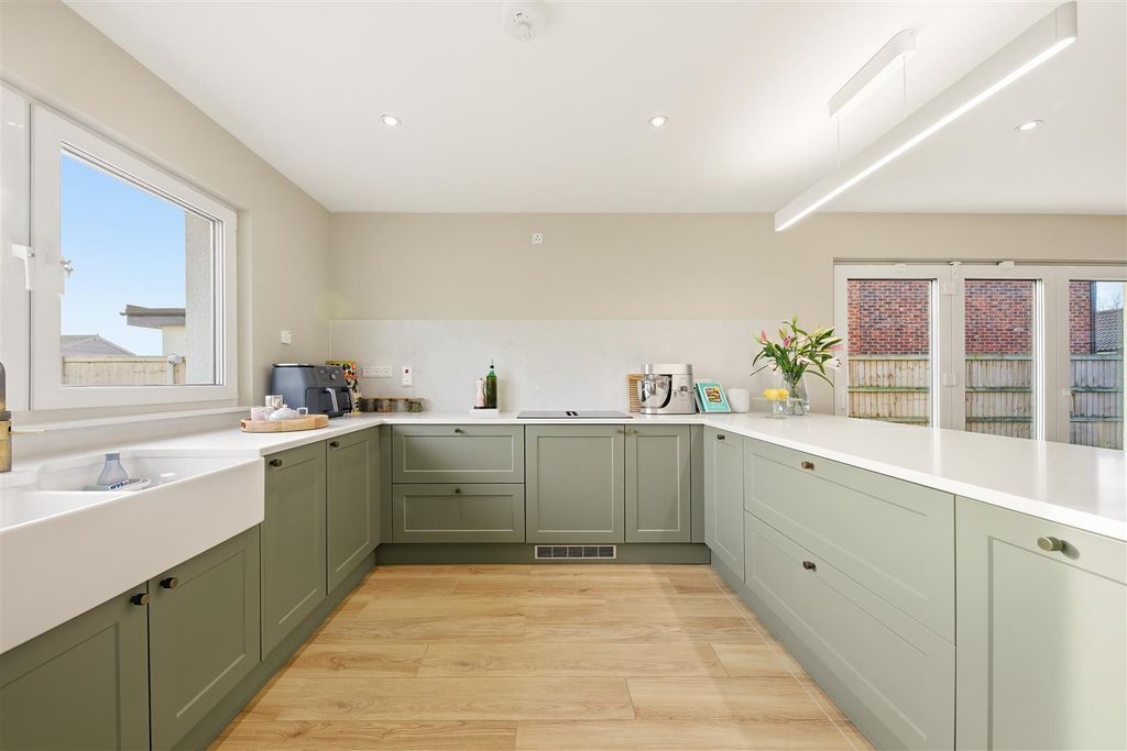 Property photo 2 of 24 Kitchen Area