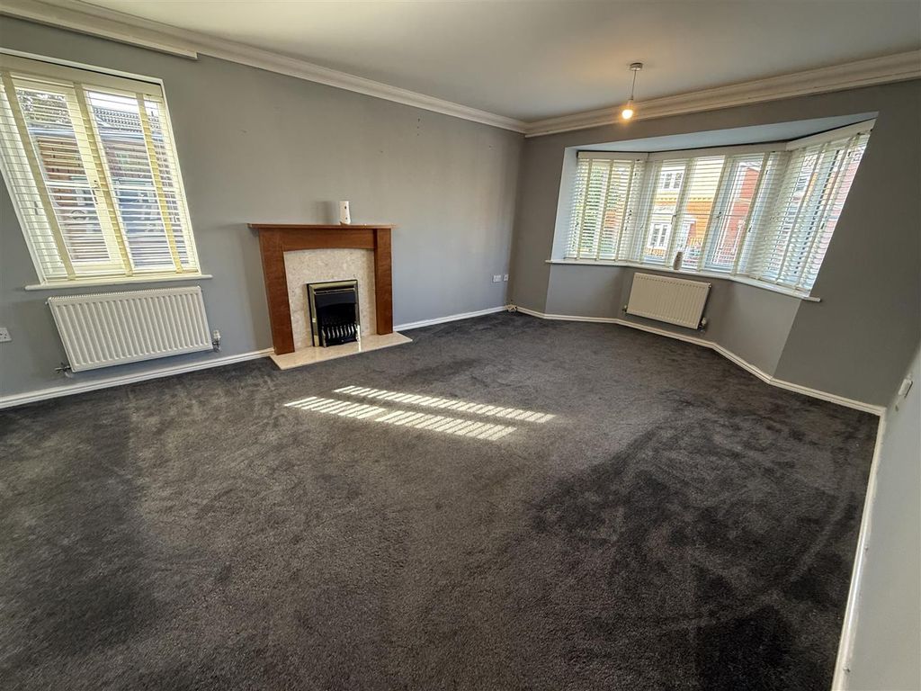 Property photo 2 of 33 Front Living Room