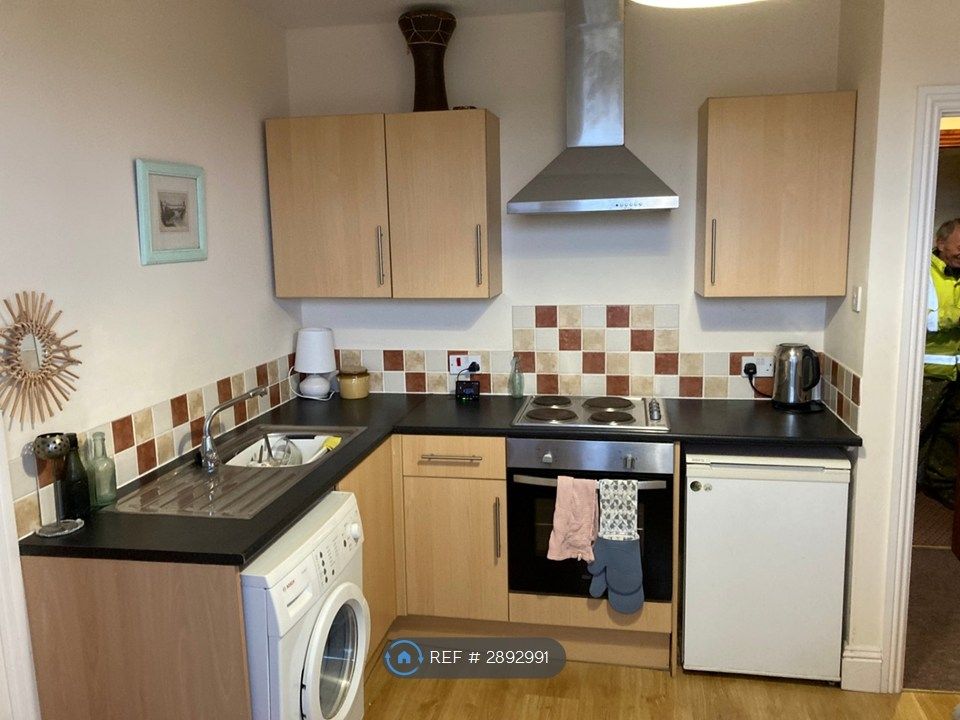 Property photo 2 of 11 Kitchen Area