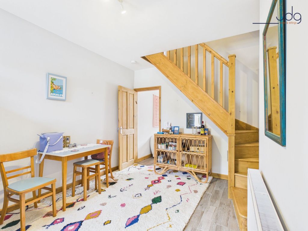 Property photo 3 of 10 Dining Room With Wooden Stairs