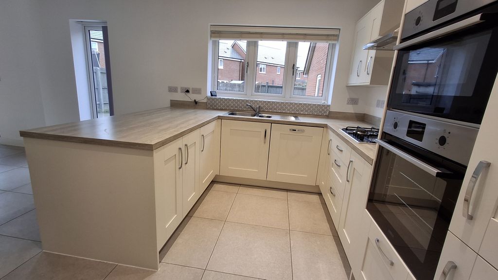 Property photo 2 of 18 Kitchen