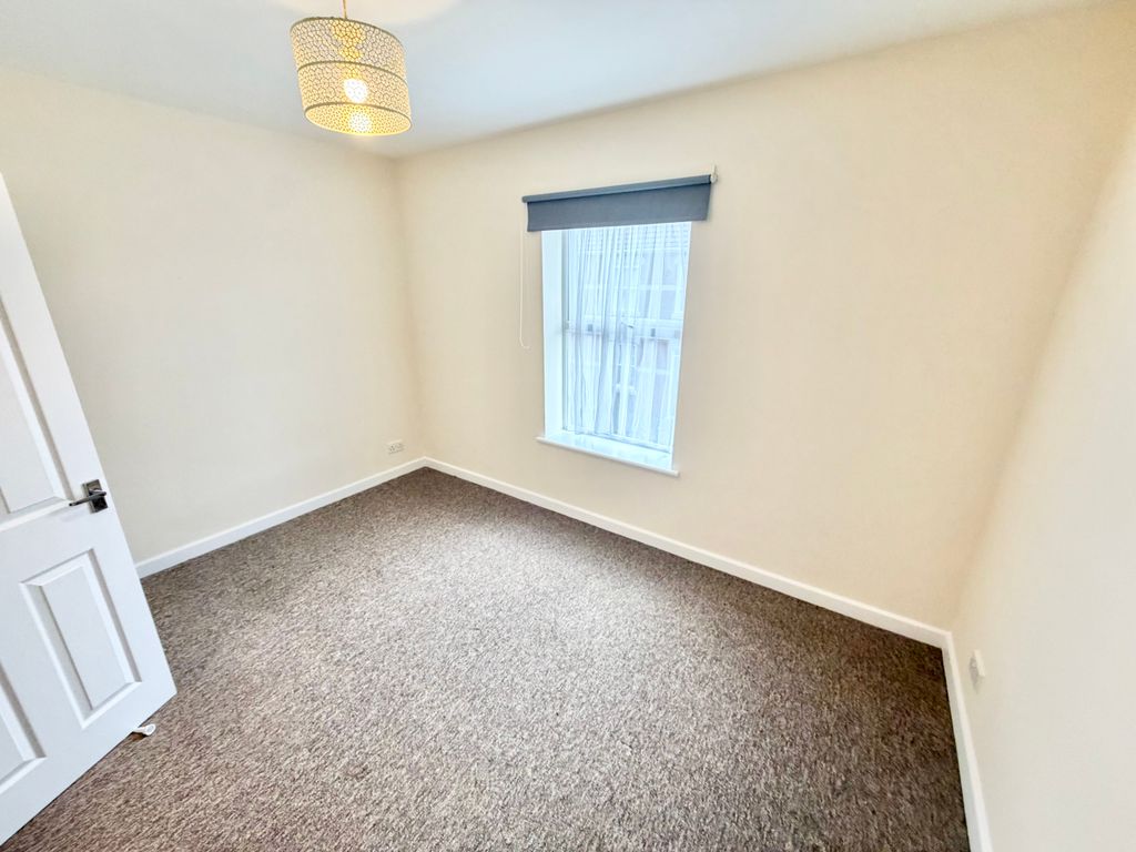 Property photo 3 of 6 Bedroom One