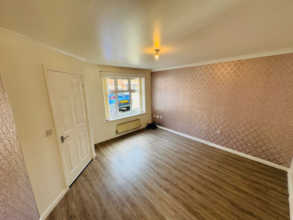 Property photo 3 of 17 Living Room 2