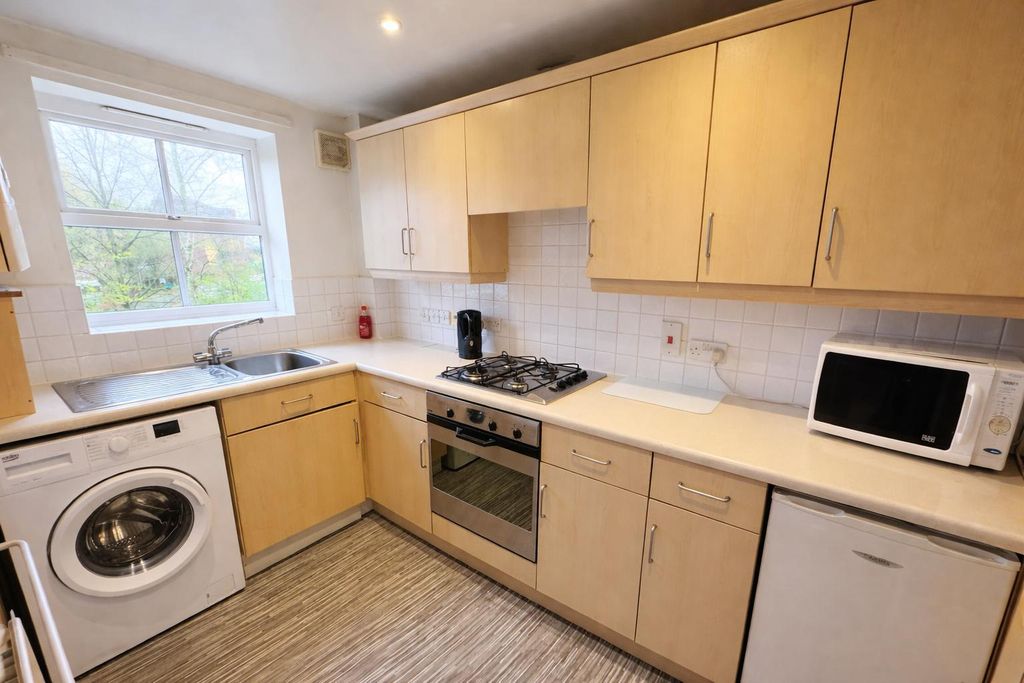 Property photo 3 of 12 Kitchen