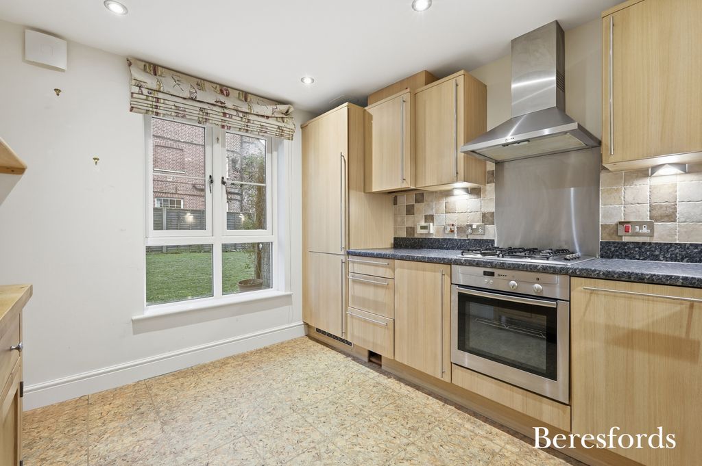 Property photo 2 of 12 Kitchen