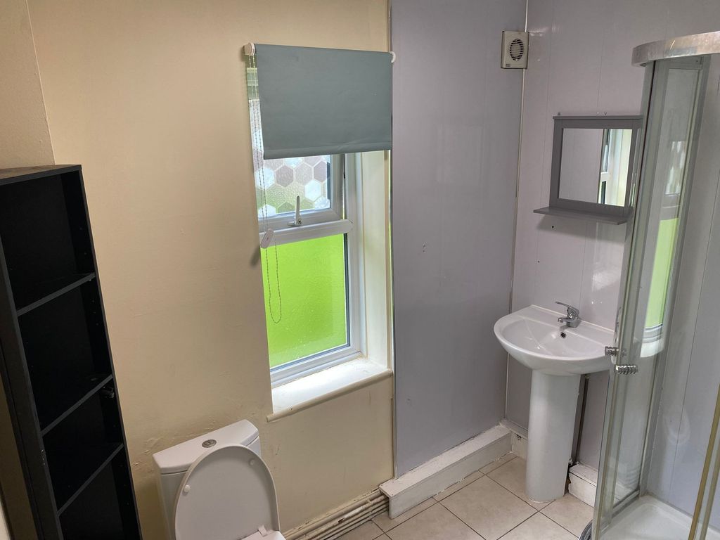 Property photo 3 of 6 A Practical Bathroom Featuring A Small Sink, Toile...