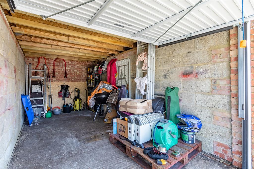 Property photo 2 of 6 Garage Interior
