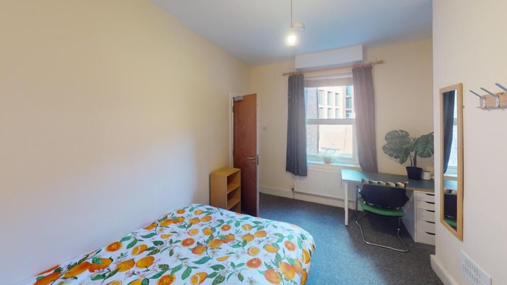 Property photo 2 of 15 Bright And Inviting Double Bedroom Featuring A Vib...
