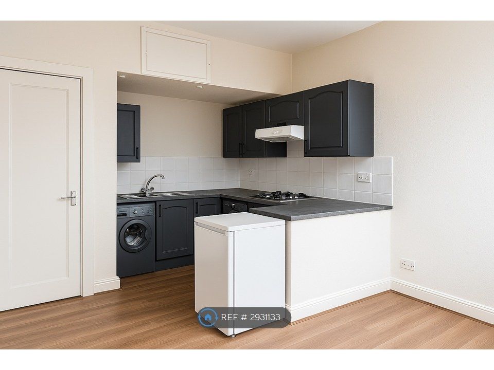 Property photo 3 of 8 Kitchen