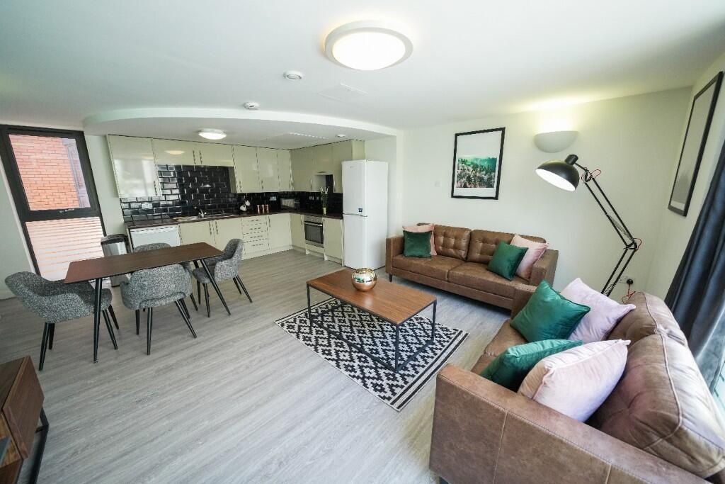 Property photo 2 of 13 Bright And Modern Open-Plan Living Room Featuring ...