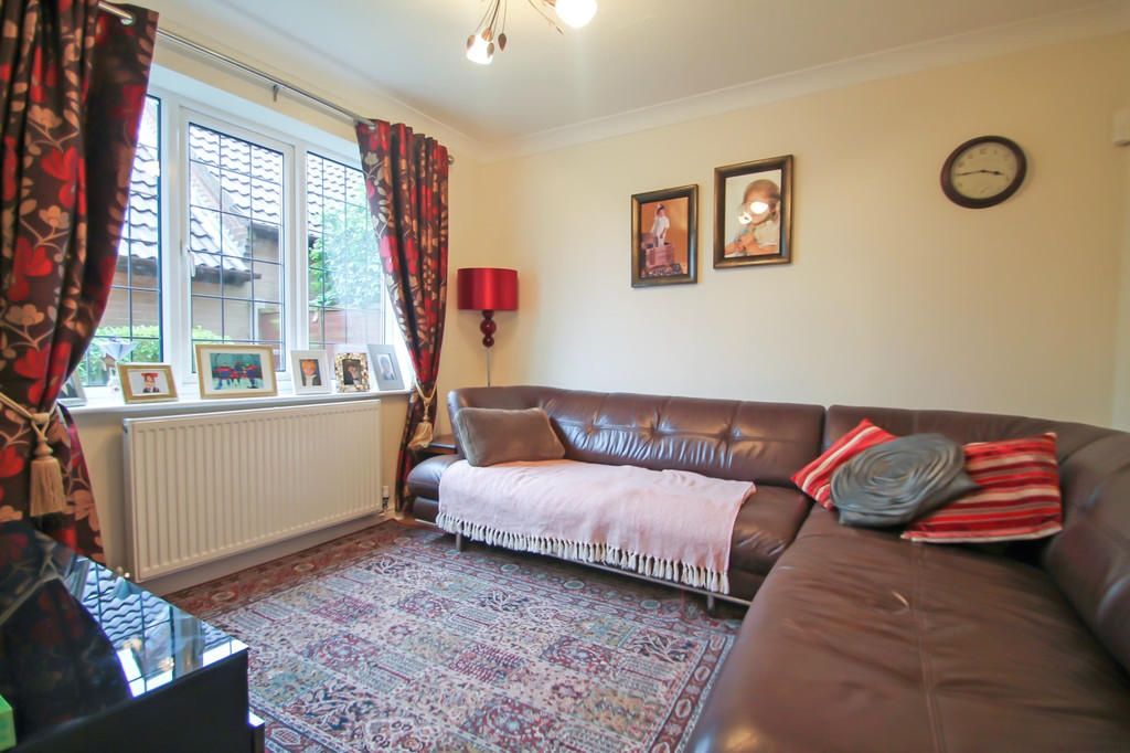 Property photo 3 of 19 Bright, Cozy Living Room With A Large L-Shaped Lea...