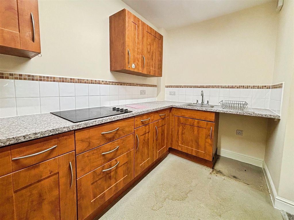 Property photo 3 of 12 Kitchen
