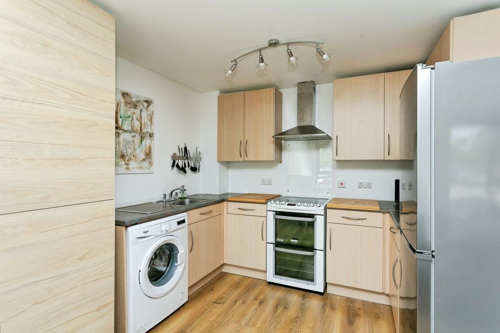 Property photo 2 of 12 Kitchen